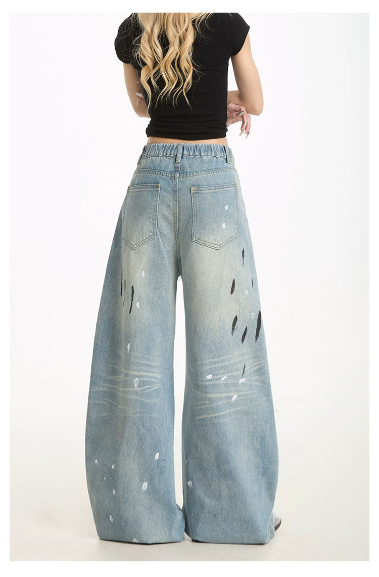 Ink-Splashed Ripped Jeans